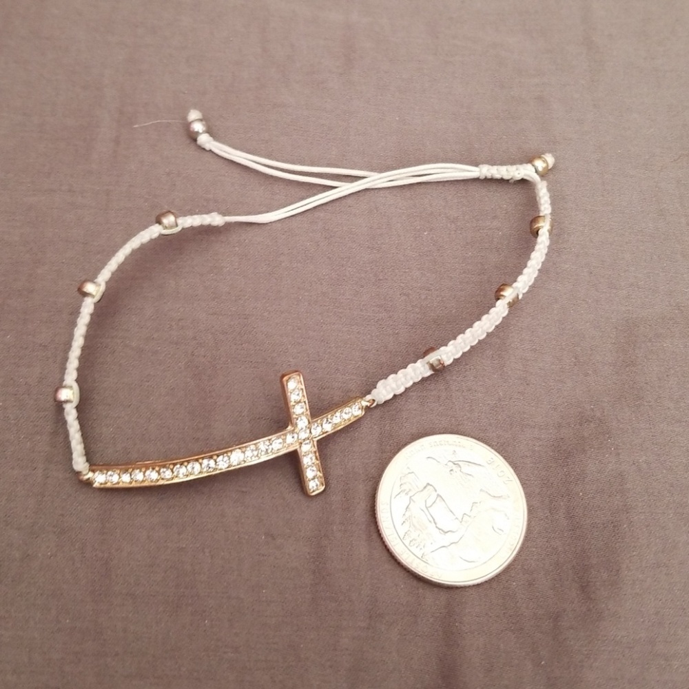 White and gold cross bracelet